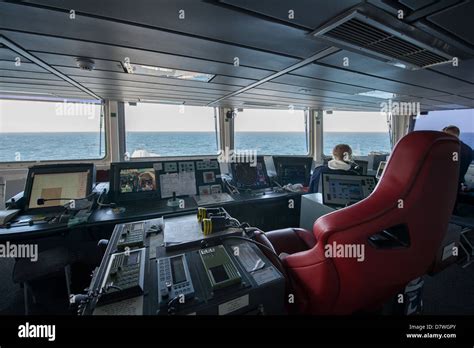 On the bridge of Royal Navy Type 45 destroyer HMS Diamond at sea with ...