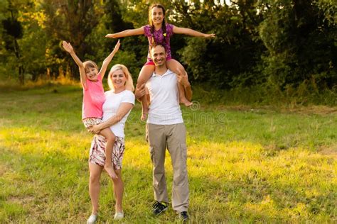 Happy Family Together Bonding Outdoors Stock Photo - Image of autumn, outdoor: 243876714