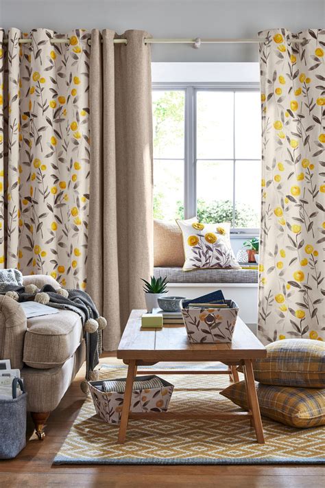 Buy Ochre Eden Floral Print Eyelet Curtains from the Next UK online ...