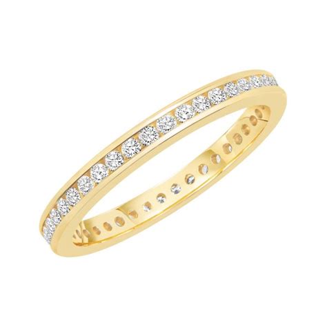 Yellow Gold Channel Set Round Diamond Eternity Band 1/2ctw | REEDS Jewelers