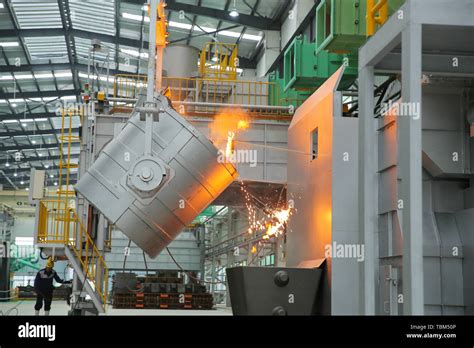 Iron and steel smelting industry in steelmaking plants Stock Photo - Alamy