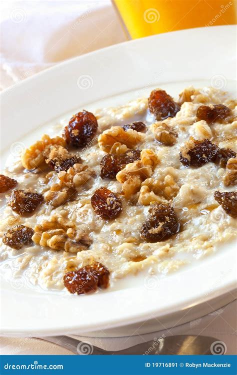 Oatmeal with Raisins and Walnuts Stock Image - Image of dried ...