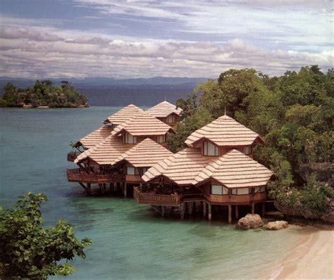 Philippine resort-house detail- I'd want part of my beach house property to have a stilt house ...