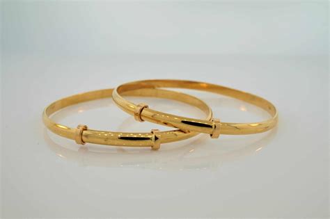 22k Adjustable Gold Baby Bangles | OM Jewellers