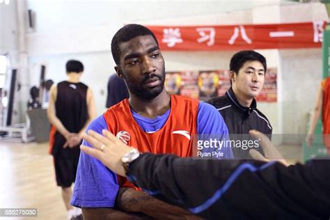 God Shammgod gets instruction from his Korean coach during a practice... News Photo - Getty Images