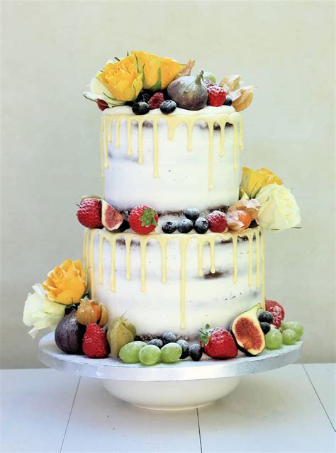 Semi-Naked Cake with Fresh Flowers, Fruits and White Chocolate Drips ...