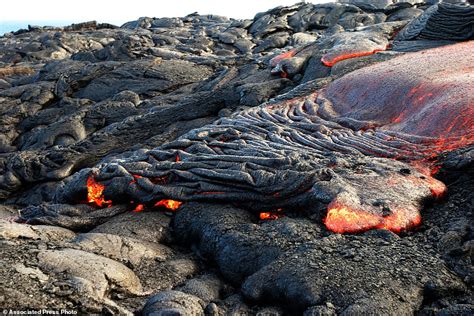 Lava from Hawaii volcano cascades into sea in vivid display | Daily Mail Online