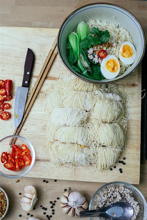 Ramen with raw pasta on table · Free Stock Photo