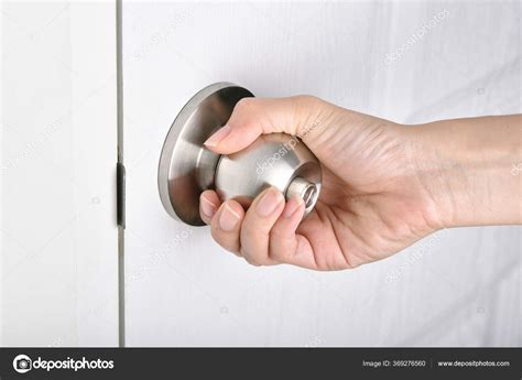 Hand Opening Door Door Knob Touching Public Surface Transmission Germ Stock Photo by ©Artfully79 ...