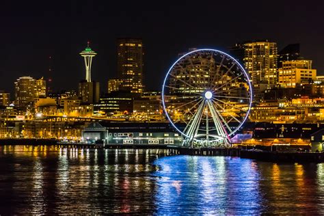 The Seattle Great Wheel and Space Needle on the Waterfront… | Flickr