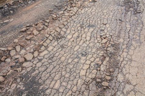 Cracked asphalt road stock image. Image of grass, sign - 44690825