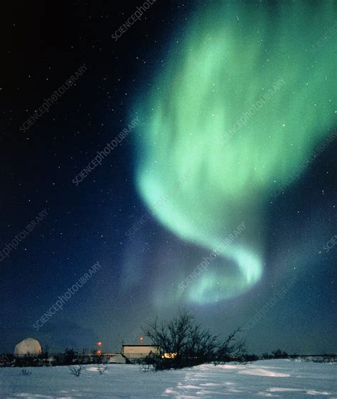 Aurora Borealis and satellite station in - Stock Image - E115/0216 - Science Photo Library