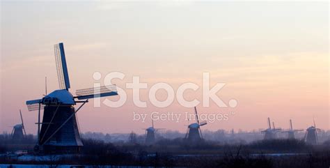 Windmills At Sunset Stock Photo | Royalty-Free | FreeImages