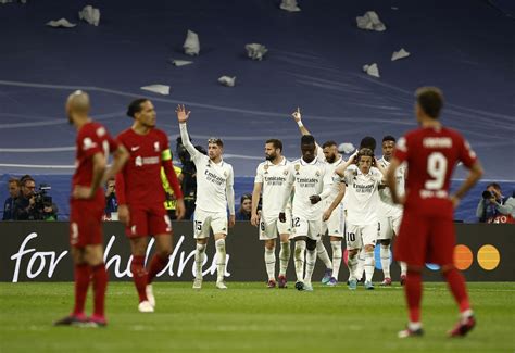 Soccer–Real Madrid ease past Liverpool into Champions League quarters ...