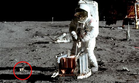 Neil Armstrong On The Moon Holding Flag