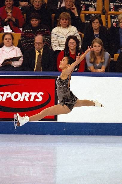 Michelle Kwan performing her technical program during the U.S. Figure Skating Championships in ...