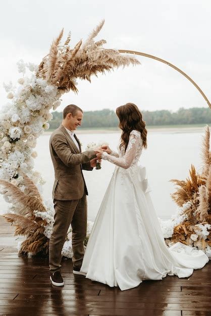 Premium Photo | Wedding ceremony of the newlyweds on the pier