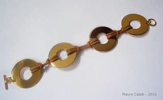 Gold bracelet | Gold and leather bracelet, by Mauro Cateb, B… | Flickr