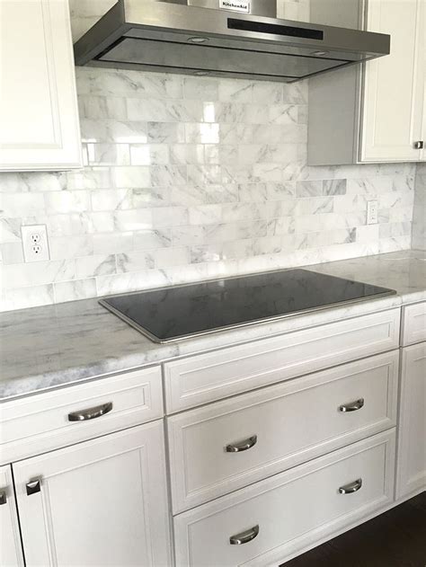 Carrera Marble Subway Tile Backsplash with white cabinets | Kitchen Ideas | Kitchen marble, New ...