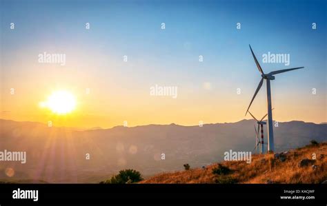 wind turbine at sunset Stock Photo - Alamy