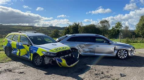 Man charged after three PSNI vehicles rammed by tractor