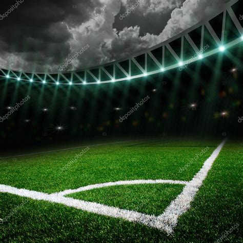 Soccer field with bright lights Stock Photo by ©jonson 20692617