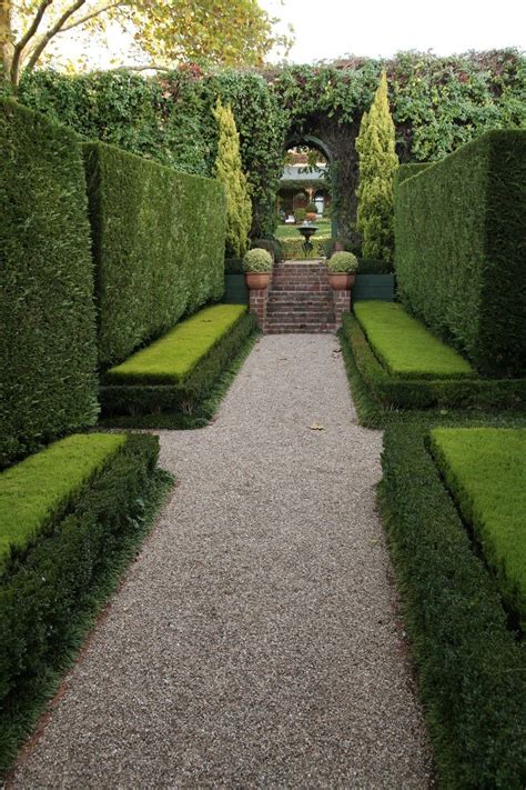 Pin on EMIRATES HILLS | Garden hedges, Formal garden design, Topiary garden