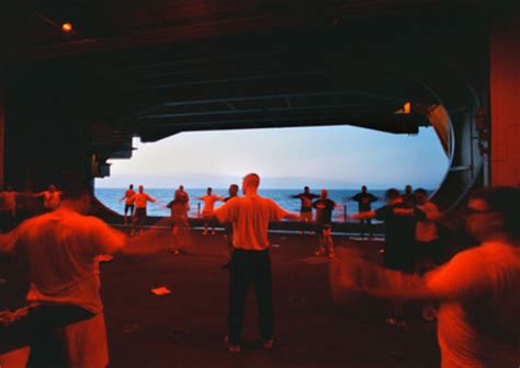 USS George Washington crew members participate in physical readiness training.