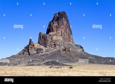 Volcanic Plug from Kayenta to Monument Valley Stock Photo - Alamy