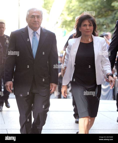 Dominique Strauss-Kahn and his wife Anne Sinclair arrive at The Court in Downtown, New York, NY ...