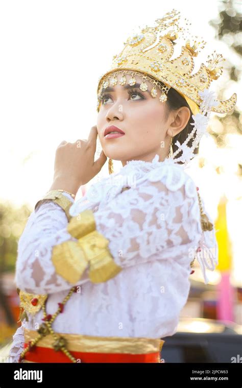 Beautiful portrait young asian woman wearing traditional Indonesian Lampung culture clothes ...