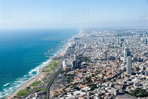 Aerial view of coastline and city, Tel Aviv, Israel - Stock Photo - Dissolve