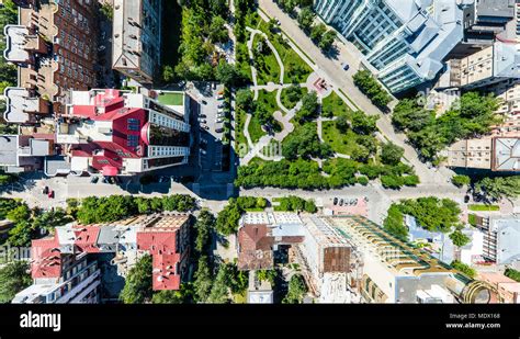 Aerial city view with roads, houses and buildings Stock Photo - Alamy