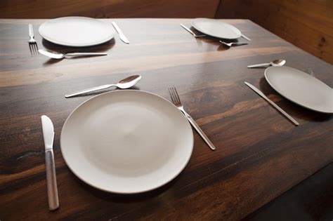 Free Stock Photo 8842 Wooden dining table with four place settings | freeimageslive