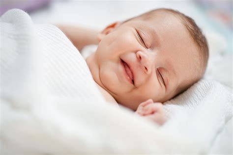 Why Do Babies Smile In Their Sleep?