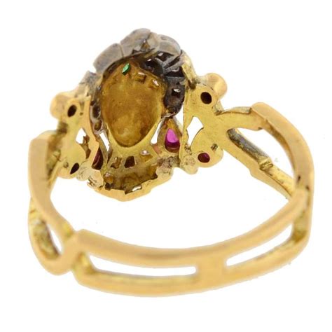 Art Deco Emerald Ruby Diamond Egyptian Revival Ring at 1stdibs