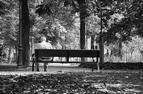 Old man sitting alone on a bench - cc0.photo