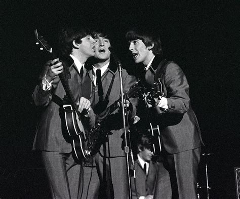 The Beatles 1964 Us Tour. L-r Paul by Popperfoto