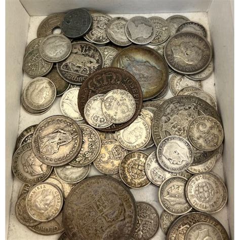 A Collection antique silver coins; includes mostly silver three pence ...