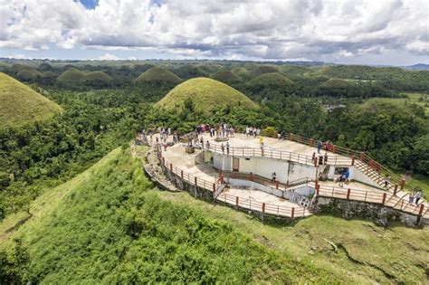 The Famous Chocolate Hills at Sunrise on a Cloudy Day with Mist Formations, Carmen, Bohol Island ...