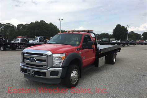 2011 Ford F550 Super Duty XLT with a Jerr Dan 19' Steel Carrier | Eastern Wrecker Sales Inc