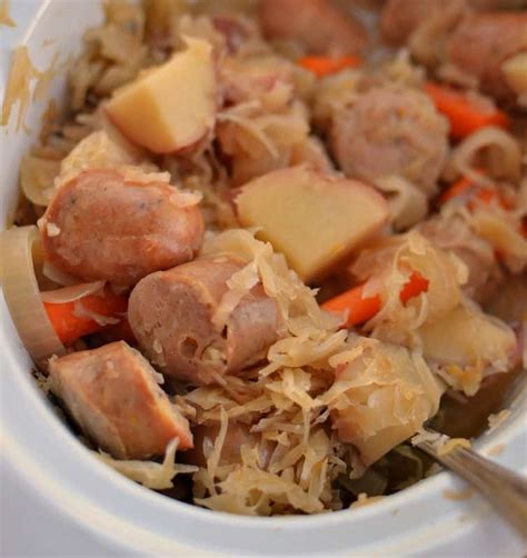 Slow Cooker Sausage Sauerkraut and Potatoes | Small Town Woman