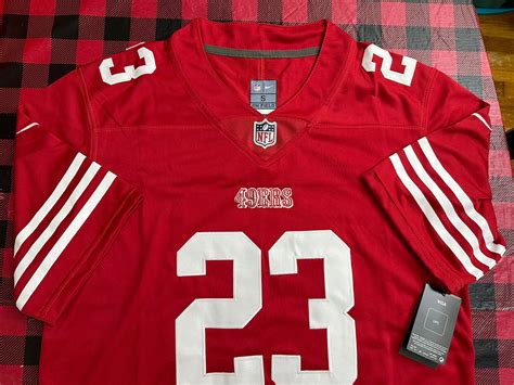 San Francisco 49ers #23 Christian McCaffrey Red stitched Football ...