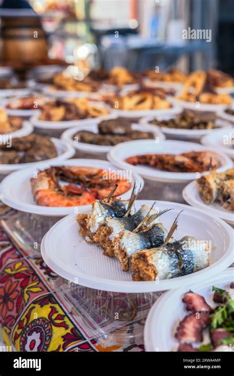 Seafood snacks at the food market Ballaro in Palermo Sicily Stock Photo ...