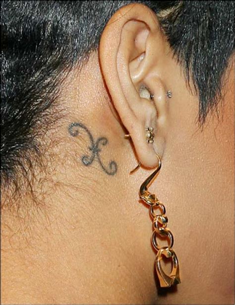 Discover The Secrets Behind 18 Of Rihanna's Tattoos - Ritely