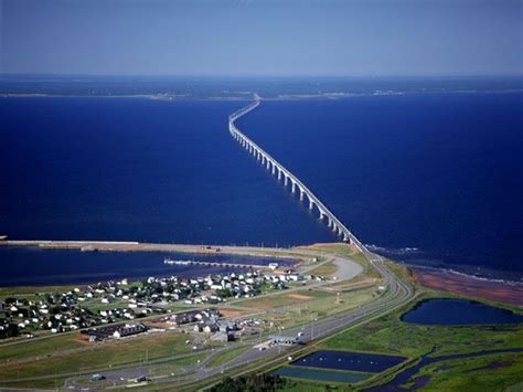 the 8 mile long Confederation Bridge connects the island province of Prince Edward Island to the ...