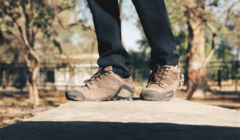 Free photo: Selective Focus Photography of Person Wearing Brown Hiking ...