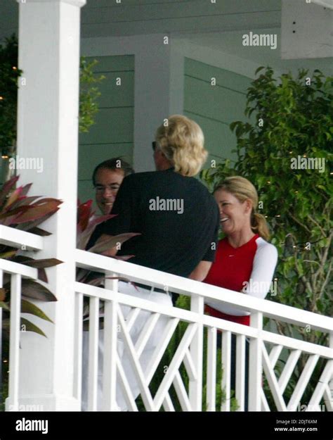 Chris Evert and Greg Norman hang out together at the clubhouse at The ...