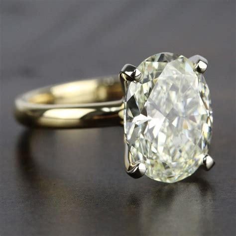 3 Carat Oval Solitaire Diamond Ring In Yellow Gold