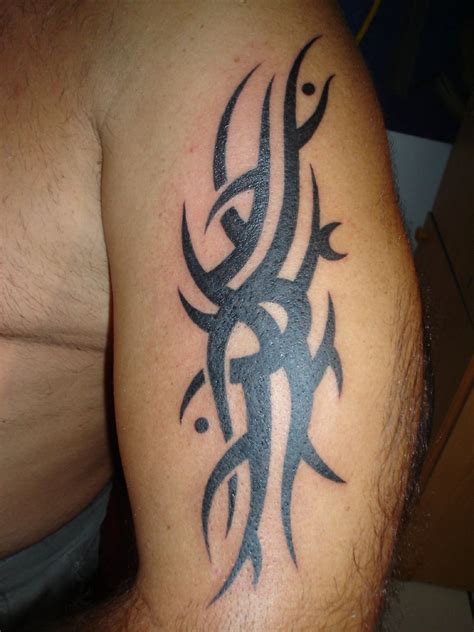 Greatest Tattoos Designs: Tribal Arm Tattoo Designs for Men